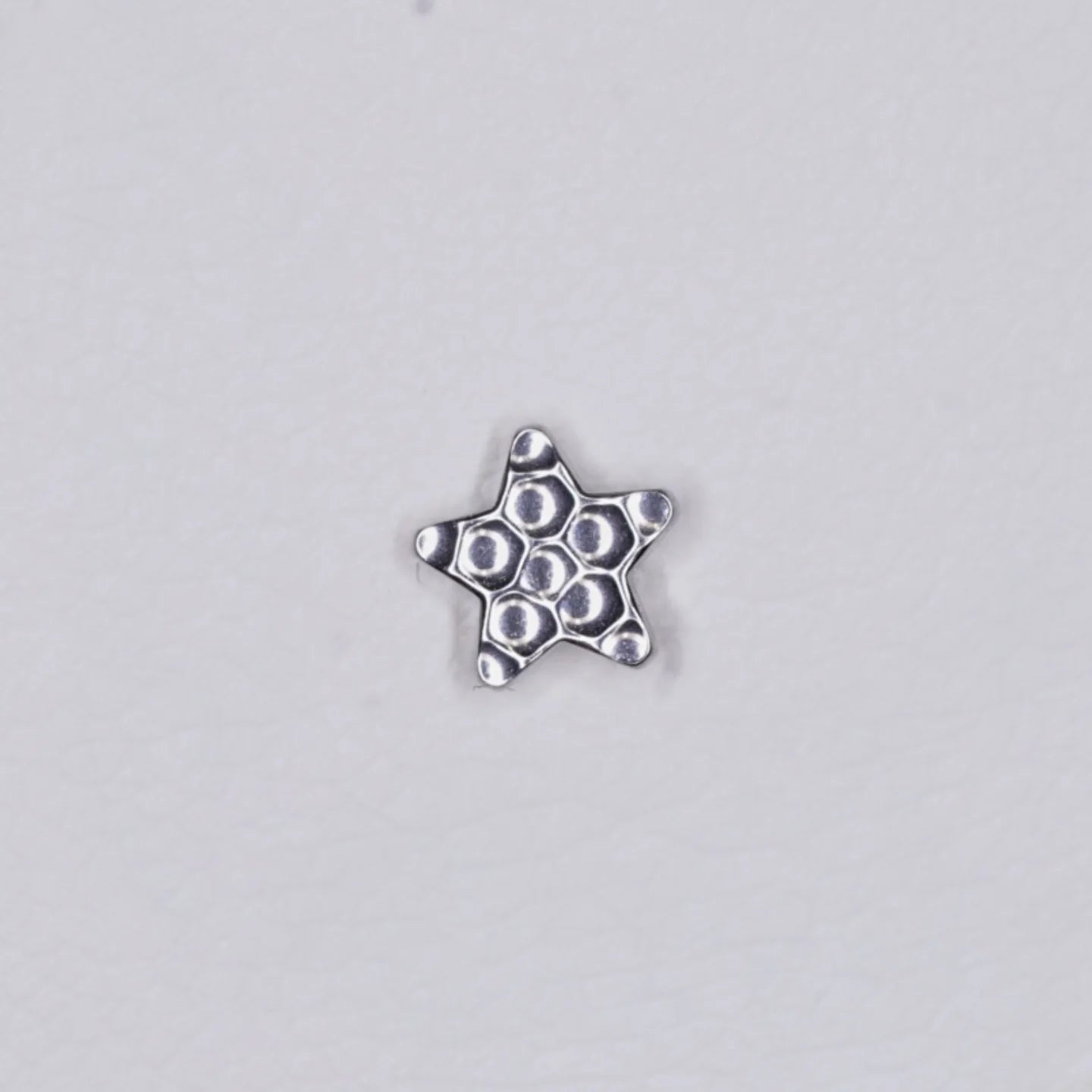 Junipurr Jewelry Titanium Hammered Star